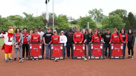 2023 softball seniors and parents on senior day