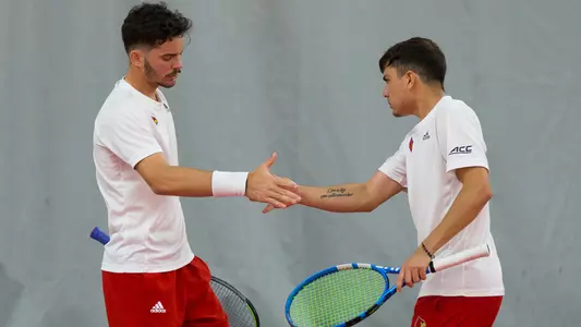 Natan Rodrigues and Sergio Hernandez celebrate after poing
