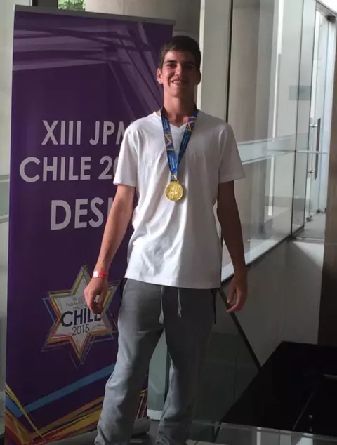 David Mizrahi wearing the gold medal from the Maccabi Games that he won in 2015. The Maccabi games is the Jewish Olympics where Jewish athletes across the world compete in.