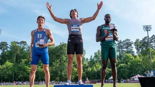 Paul Kallenberg celebrates after winning the conference title in the decathlon at the ACC Outdoor Championships.