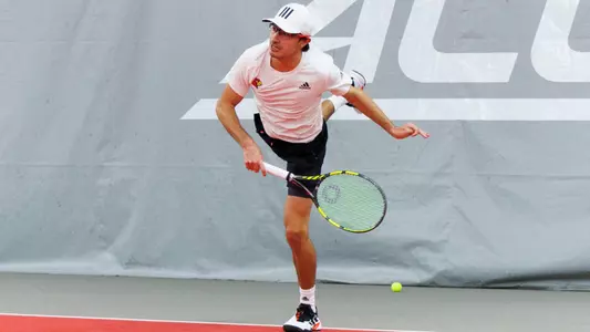 Alex Wesbrooks returns the ball
