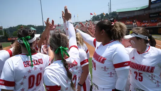 Softball huddle in the Sunday NCAA Knoxville Regional game against Indiana