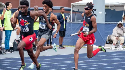 Nolan Macklin and Cameron Miller make the first exchange as the men's 4x100m relay team qualifies for the 2023 NCAA Outdoor Championships.