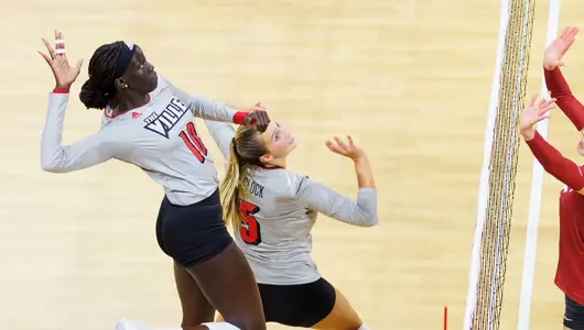 Phekran Kong hits the ball during the game against Washington State at L&N Arena on August 26, 2023.