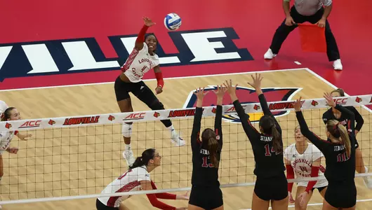 Charitie Luper hits over the Stanford block