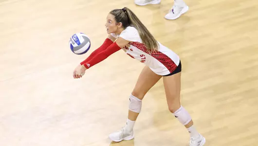 Elena Scott digs the ball