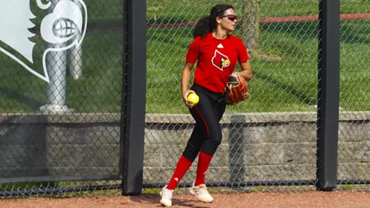Outfielder Paige Geraghty prepares to throw the ball