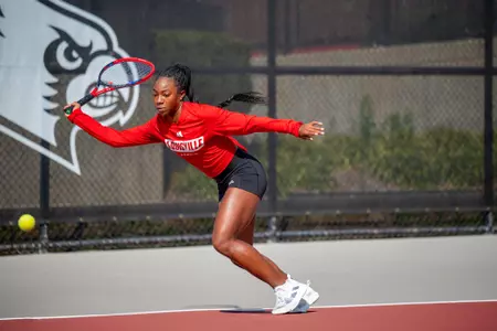 Germany Davis returns a shot