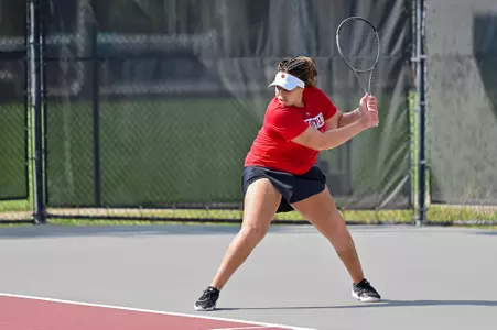 Ibifuro Clement returns a volley