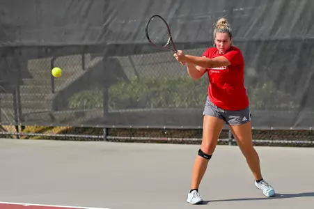 Allie Gretkowski returns a volley