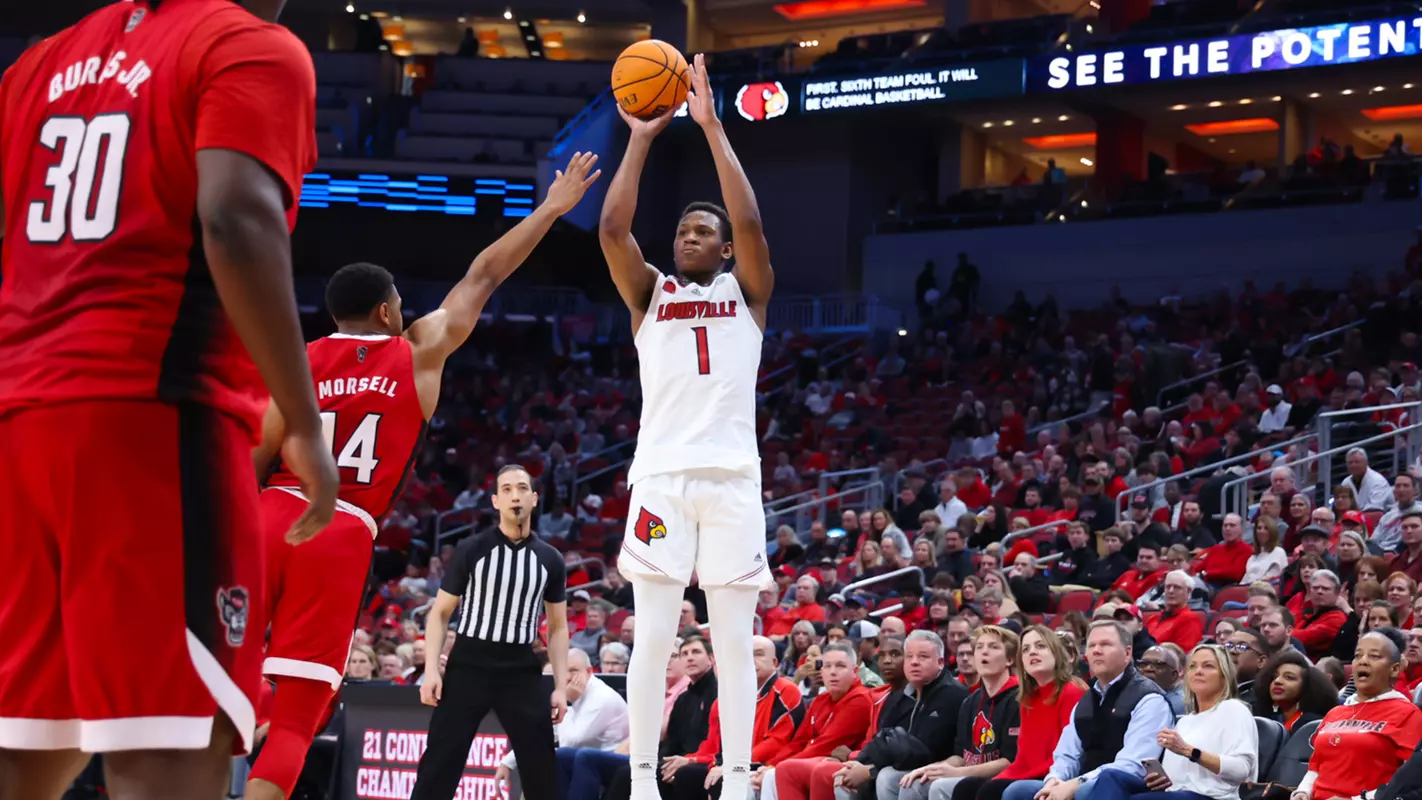 Curtis Williams shoots a 3-pointer against NC State on Jan. 13, 2024, at the KFC Yum! Center.