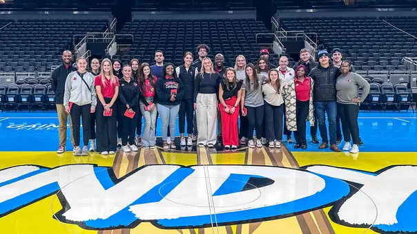 UofL student-athletes and interns pose for a picture during a career exploration trip to Indianapolis.