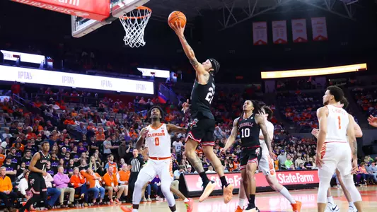 Tre White attacks the basket at Clemson on Jan. 30, 2024.