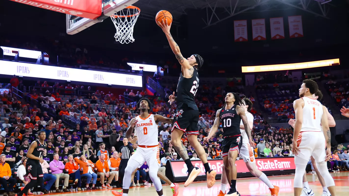 Tre White attacks the basket at Clemson on Jan. 30, 2024.