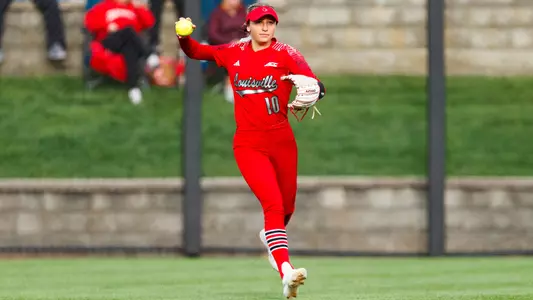 Chelsea Mack makes the throw from the outfield vs. Michigan