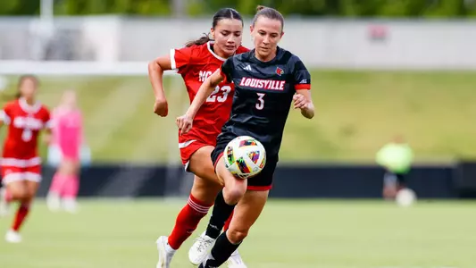 Mackenzie Geigle runs the ball up field against NC State at Lynn Stadium on September 29.