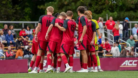 The Cardinals huddle before playing Boston College.