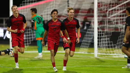 Elijah Brijbasi and Parker Forbes celebrate a goal against Milwaukee.