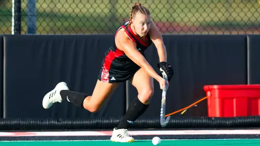 Chloe Plumb inserts the ball on a penalty corner