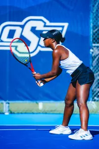Germany Davis crouches to receive a serve
