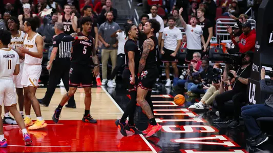 J'Vonne Hadley and Chucky Hepburn celebrate against Winthrop on Nov. 22, 2024