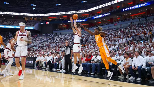 Reyne Smith shooting a 3-pointer at the KFC Yum! Center on Saturday afternoon against No. 12 Tennessee