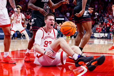 Noah Waterman celebrates after scoring against Eastern Kentucky at the KFC Yum Center on December 28.