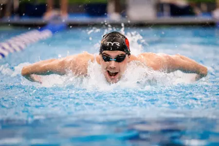 The Cardinals swim the butterfly