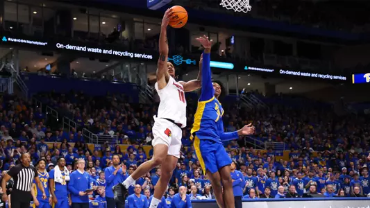 Kaleb Glenn attacks the basket at PItt on Saturday, Feb. 17, 2014.