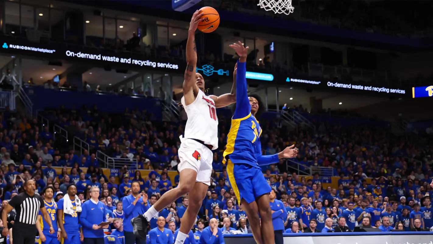 Kaleb Glenn attacks the basket at PItt on Saturday, Feb. 17, 2014.