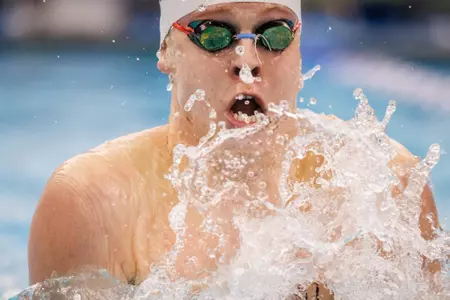 Tommy Bried swims the breast during the 400 IM