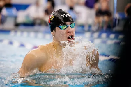 Denis Petrashov swims the breaststroke