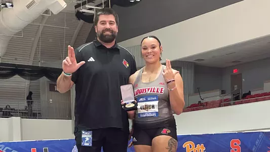 Cory Martin and Jayden Ulrich on the podium after Ulrich won the shot put at the ACC Indoor Championships