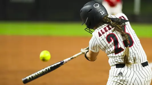 Ally Alexander hits the ball against Indiana