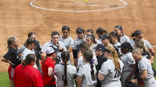 Louisville softball huddle at North Carolina