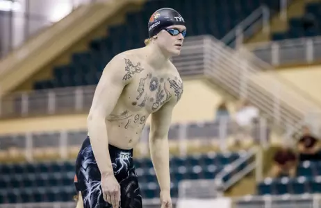 Evgenii Somov stands on the blocks