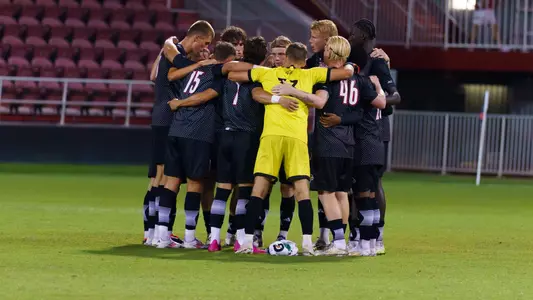 The Cardinals huddle before playing Indiana.