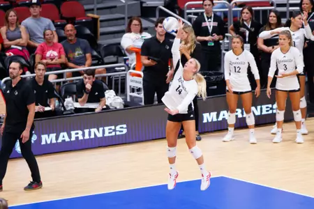 Anna DeBeer serves the ball during the match against #3 Wisconsin at the AVCA Showcase held in the KFC Yum! Center on August 27, 2024.