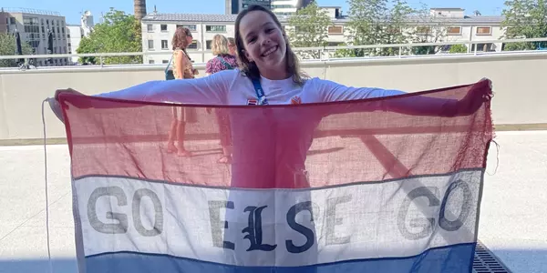 Else Praasterink holds the Dutch flag at the Olympics