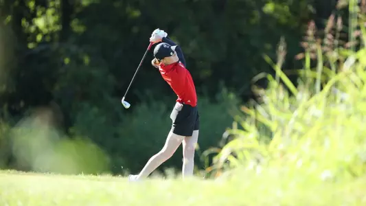 Carmen Griffiths tees off at the Cardinal Cup