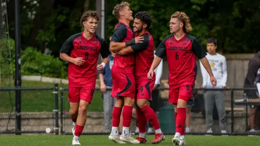 The Cardinals celebrate a Gage Guerra goal at Boston College.