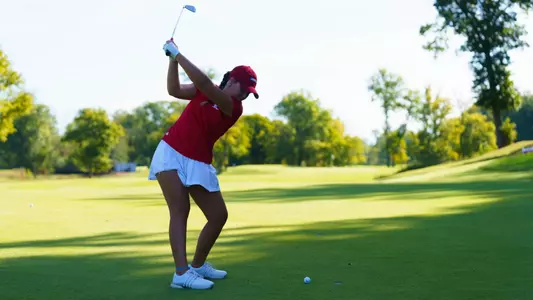 Bailey Burkett hits an approach shot at the Blessings Collegiate Invitational