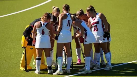 Louisville field hockey huddle at Boston College