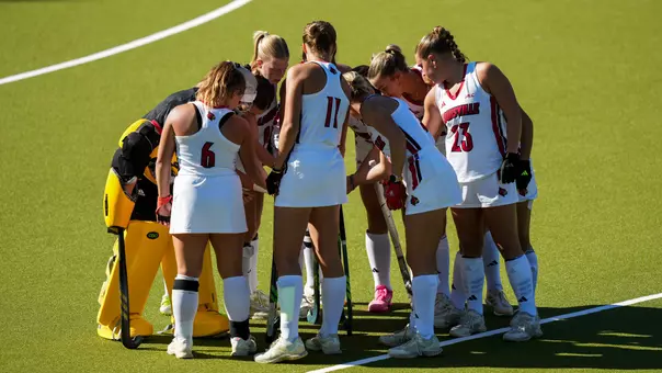 Louisville field hockey huddle at Boston College