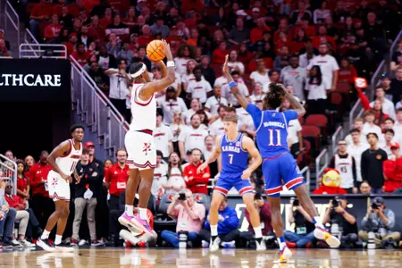 Ryan Conwell shoots the ball over a Kansas defender