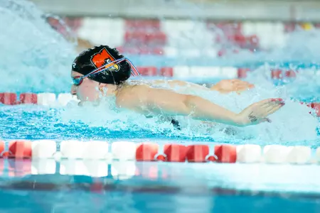 Caroline Larsen swims the fly