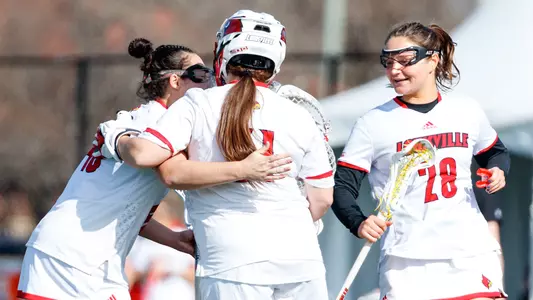 Louisville celebrates during the Denver game