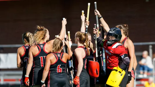 Louisville field hockey huddle vs. Duke