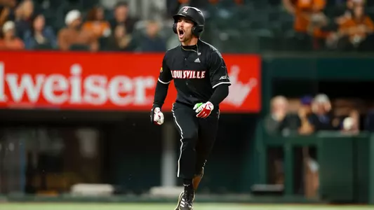 Lucas Moore celebrating a walk-off single against Texas.