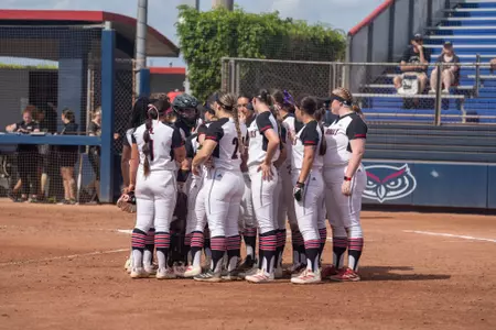 Softball huddle vs FAU